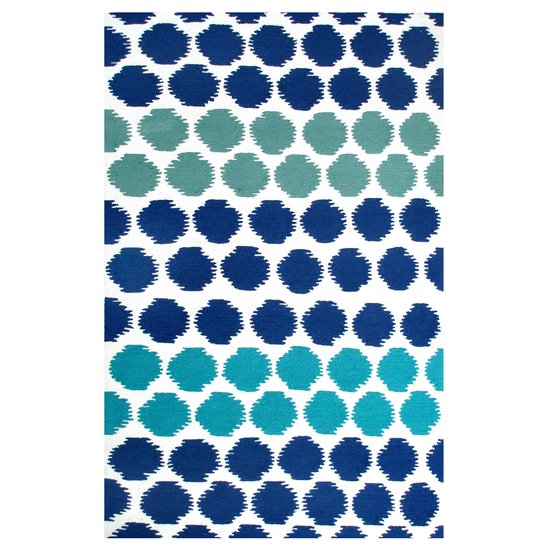 A mix of cool shades makes this blue dotted rug ($500-$1,000) a fun, graphic option.
A mix of cool shades makes this blue dotted rug ($500-$1,000) a fun, graphic option.