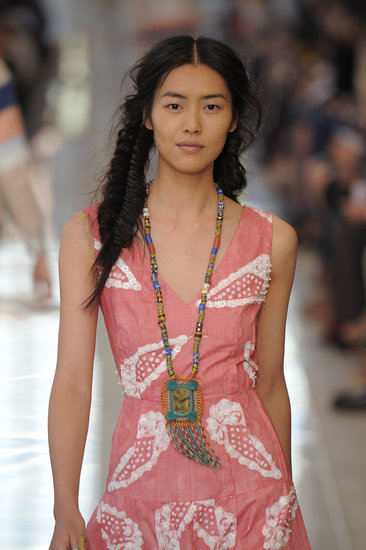 Fishtail braids don't need to fly solo. Put a spin on your pigtails by fishtailing them for a boho feel, like Tory Burch did at her Spring 2013 show.
Fishtail braids don't need to fly solo. Put a spin on your pigtails by fishtailing them for a boho feel, like Tory Burch did at her Spring 2013 show.