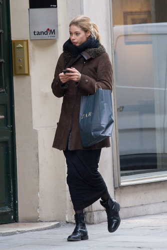Doutzen Kroes strolled the streets of Paris in a bundled-up look, including a black maxi skirt and lace-up combat boots.
Doutzen Kroes strolled the streets of Paris in a bundled-up look, including a black maxi skirt and lace-up combat boots.