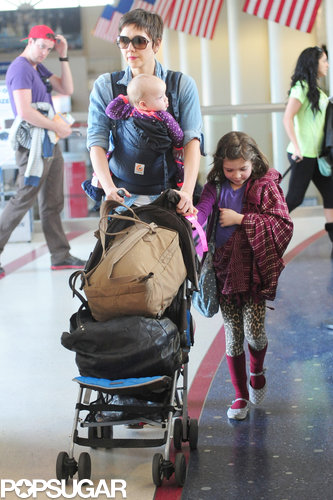 Maggie Gyllenhaal Lands in LA With Her Daughters and a New Pixie Cut Maggie Gyllenhaal Lands in LA With Her Daughters and a New Pixie Cut