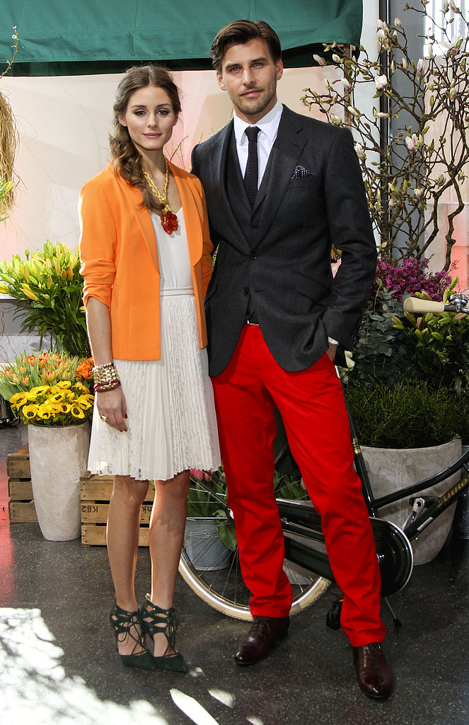 With nods to Spring, Olivia outfitted a sweet, pleated day dress with a bright tangerine-hued jacket and coral jewels, then finished the look with a pair of lace-up heels for a presentation in Hamburg, alongside beau Johannes Huebl.
With nods to Spring, Olivia outfitted a sweet, pleated day dress with a bright tangerine-hued jacket and coral jewels, then finished the look with a pair of lace-up heels for a presentation in Hamburg, alongside beau Johannes Huebl.