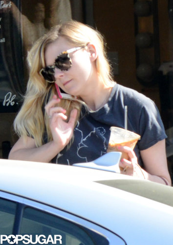 Kirsten Dunst took a phone call before getting into her car.
Kirsten Dunst took a phone call before getting into her car.