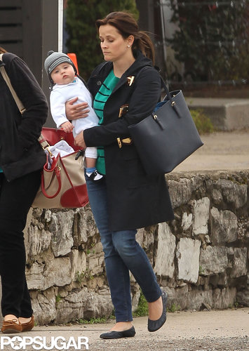 Reese Witherspoon debuted dark brown hair in Nashville with baby Tennessee.
Reese Witherspoon debuted dark brown hair in Nashville with baby Tennessee.