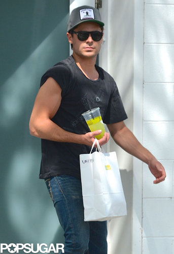 Zac Efron showed off his muscles in a t-shirt on set in LA.
Zac Efron showed off his muscles in a t-shirt on set in LA.