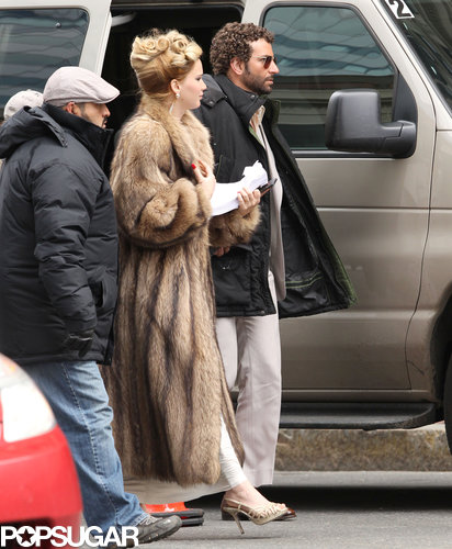 Jennifer Lawrence and Bradley Cooper reunited on their David O. Russell set in Boston sporting retro looks.
Jennifer Lawrence and Bradley Cooper reunited on their David O. Russell set in Boston sporting retro looks.