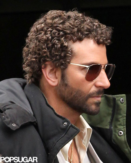 Bradley Cooper sported tight curls on the set of his untitled David O. Russell film.
Bradley Cooper sported tight curls on the set of his untitled David O. Russell film.