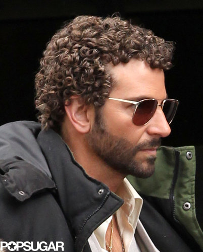 Bradley Cooper sported tight curls on the set of his untitled David O. Russell film.
Bradley Cooper sported tight curls on the set of his untitled David O. Russell film.