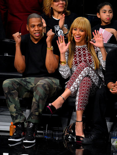 Beyoncé chose a head-to-toe printed Tibi ensemble, while Jay-Z styled camouflage pants with a black tee for a courtside appearance in November 2012.
Beyoncé chose a head-to-toe printed Tibi ensemble, while Jay-Z styled camouflage pants with a black tee for a courtside appearance in November 2012.