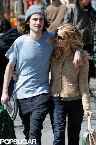 Sienna Miller kept close to her fiancé, Tom Sturridge.
Sienna Miller kept close to her fiancé, Tom Sturridge.
