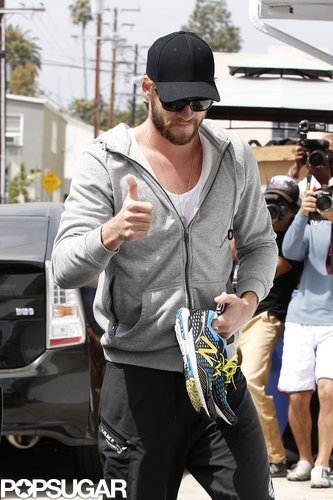 Liam Hemsworth flashed a thumbs-up.
Liam Hemsworth flashed a thumbs-up.