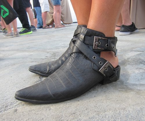 These pointy-toe ankle-strap boots with an open back are so awesomely futuristic that only cool girls need apply here.
These pointy-toe ankle-strap boots with an open back are so awesomely futuristic that only cool girls need apply here.