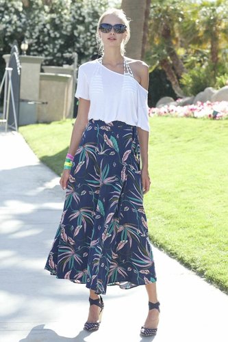 Studded footwear added a dose of edge to this flowy Coachella party look.
Studded footwear added a dose of edge to this flowy Coachella party look.
