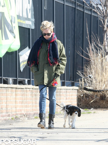 Michelle Williams bundled up in a big scarf.
Michelle Williams bundled up in a big scarf.