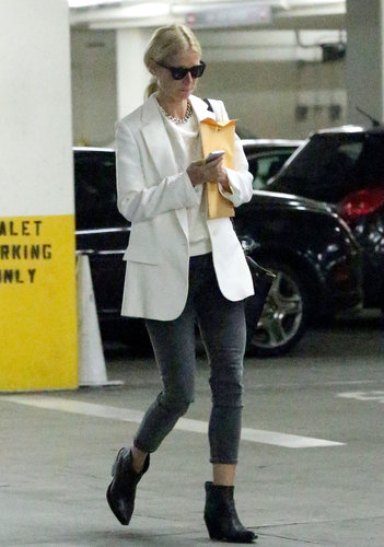 Gwyneth Paltrow's white boyfriend blazer and white top added a crisp edge to her cropped denim in LA.
Gwyneth Paltrow's white boyfriend blazer and white top added a crisp edge to her cropped denim in LA.