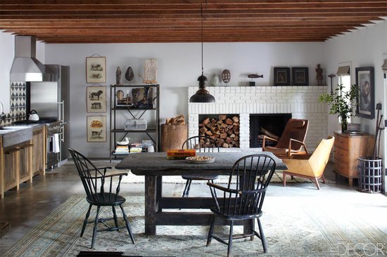 The kitchen in Cabin 6 even includes a hearth, complete with a midcentury Danish lounge chair (with its original leather intact) for curling up with a book or a glass of wine. To snag the look of their industrial shelving unit, try styling a mix of books and objects from your travels onto this bookcase.
The kitchen in Cabin 6 even includes a hearth, complete with a midcentury Danish lounge chair (with its original leather intact) for curling up with a book or a glass of wine. To snag the look of their industrial shelving unit, try styling a mix of books and objects from your travels onto this bookcase.