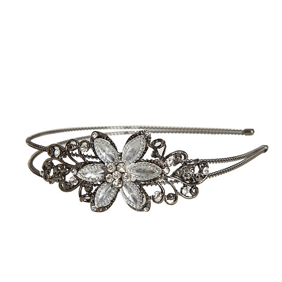 A pretty headband is something that all your bridesmaids will enjoy, and one with delicate stones like WetSeal's Paved Edge Headband ($8) is decidedly decadent.
A pretty headband is something that all your bridesmaids will enjoy, and one with delicate stones like WetSeal's Paved Edge Headband ($8) is decidedly decadent.