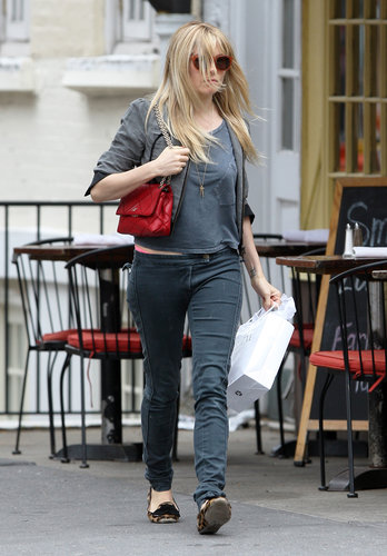 Sienna Miller stuck to a gray palette during a day out in NYC, then punched it all up via a red quilted Roger Vivier bag and her leopard loafers.
Sienna Miller stuck to a gray palette during a day out in NYC, then punched it all up via a red quilted Roger Vivier bag and her leopard loafers.
