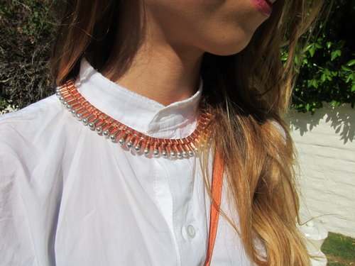 The rose-gold and silver bib necklace is equal parts pretty and tough.
The rose-gold and silver bib necklace is equal parts pretty and tough.