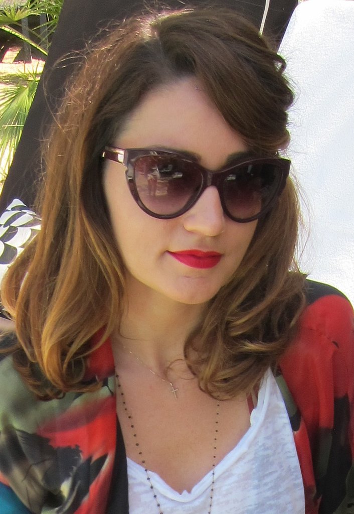 A pop of red across the lips was the cornerstone to this modern-vintage look.
Photo: Meg Cuna
A pop of red across the lips was the cornerstone to this modern-vintage look.
Photo: Meg Cuna