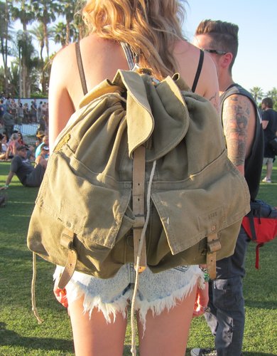 An oversize army-green backpack can fit your entire day's essentials and double as a pillow while you lounge on the lawn.
An oversize army-green backpack can fit your entire day's essentials and double as a pillow while you lounge on the lawn.