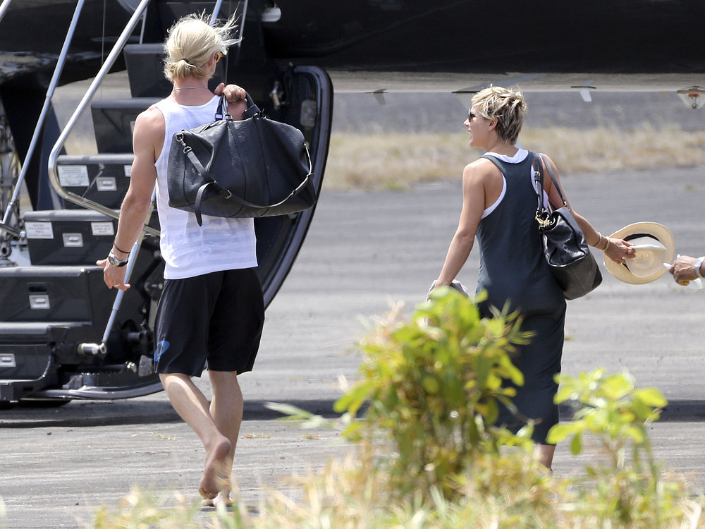 Chris Hemsworth and wife Elsa Pataky prepared to leave St. Lucia after attending Matt and Luciana Damon's wedding vow renewal ceremony in April 2013.
Chris Hemsworth and wife Elsa Pataky prepared to leave St. Lucia after attending Matt and Luciana Damon's wedding vow renewal ceremony in April 2013.