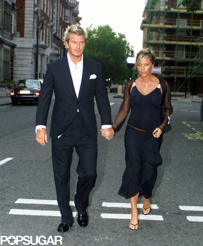 Victoria Beckham was pregnant with Romeo in July of 2002 as she and David attended the christening of Elizabeth Hurley's son in London.
Victoria Beckham was pregnant with Romeo in July of 2002 as she and David attended the christening of Elizabeth Hurley's son in London.