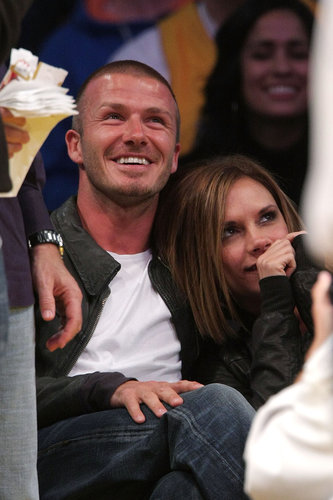 David Beckham and Victoria showed love for their new town in May 2008 as they cuddled up at a Lakers game.
David Beckham and Victoria showed love for their new town in May 2008 as they cuddled up at a Lakers game.