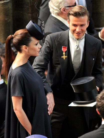 David Beckham put a hand on Victoria's pregnant belly at the royal wedding of Prince William and Kate Middleton in April 2011.
David Beckham put a hand on Victoria's pregnant belly at the royal wedding of Prince William and Kate Middleton in April 2011.