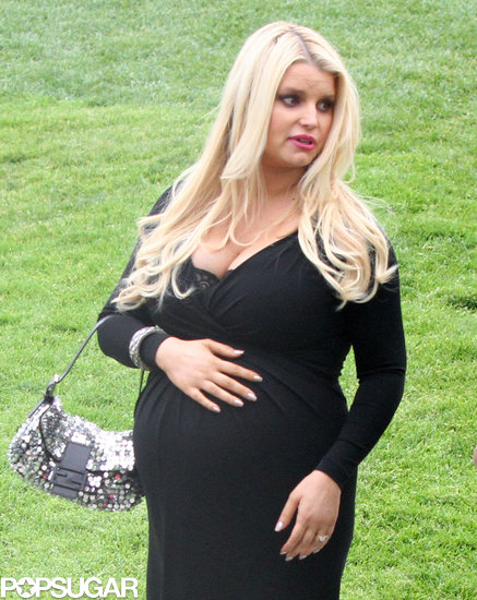 Jessica Simpson showed off her baby bump in a black dress.
Jessica Simpson showed off her baby bump in a black dress.