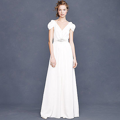 The cap sleeves on this J.Crew cap-sleeve gown ($875) are undeniably romantic. We love the jeweled belt, too.
The cap sleeves on this J.Crew cap-sleeve gown ($875) are undeniably romantic. We love the jeweled belt, too.