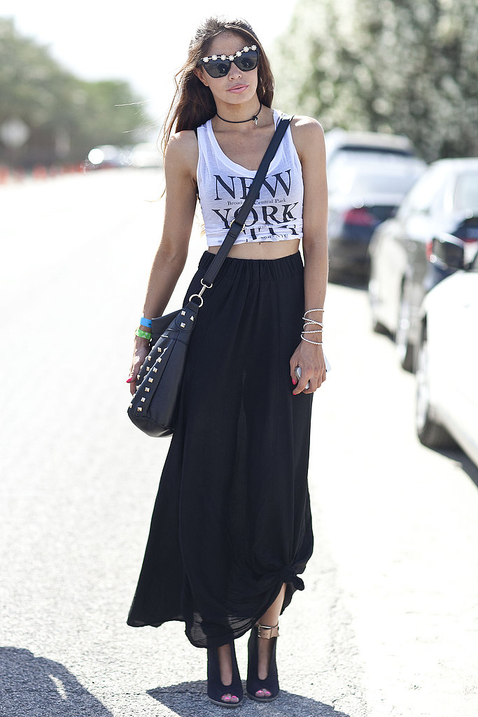 This Coachella party attendee showed off her city cred in black maxi, NYC tank, and tough accessories.
This Coachella party attendee showed off her city cred in black maxi, NYC tank, and tough accessories.