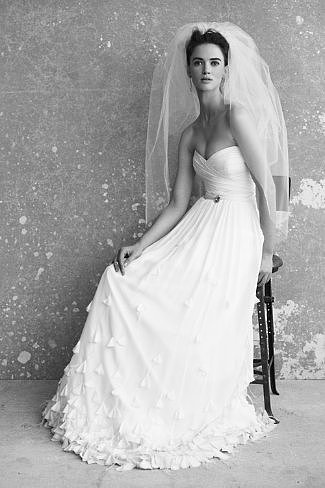The ruching on this There Is Only You and Me strapless feather-trimmed down ($1,400, originally $2,800) is super flattering, especially if you want to show off a bit of cleavage.
The ruching on this There Is Only You and Me strapless feather-trimmed down ($1,400, originally $2,800) is super flattering, especially if you want to show off a bit of cleavage.