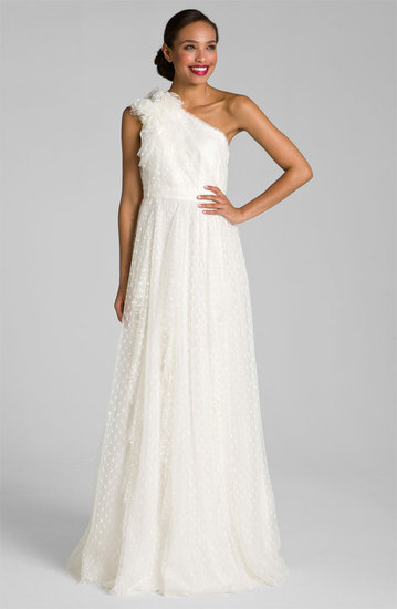 One-shouldered wedding gowns are so unique and this Carmen Marc Valvo dotted tulle one-shoulder gown ($1,080) has adorable dots that make it even more lovable.
One-shouldered wedding gowns are so unique and this Carmen Marc Valvo dotted tulle one-shoulder gown ($1,080) has adorable dots that make it even more lovable.