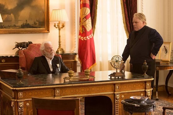 Donald Sutherland as President Snow and Philip Seymour Hoffman as Plutarch Heavensbee in Catching Fire.
Donald Sutherland as President Snow and Philip Seymour Hoffman as Plutarch Heavensbee in Catching Fire.