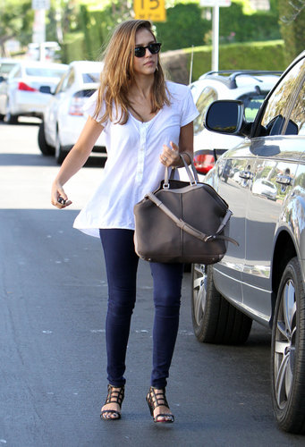 Jessica put a polished twist on the classic jeans-and-white-tee combo with caged Surface to Air sandals and a two-toned Tod's bag in West Hollywood.
Jessica put a polished twist on the classic jeans-and-white-tee combo with caged Surface to Air sandals and a two-toned Tod's bag in West Hollywood.