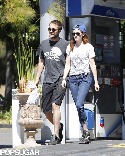 Robert Pattinson Gets Cute With His Pup During an Outing With Kristen Stewart Robert Pattinson Gets Cute With His Pup During an Outing With Kristen Stewart