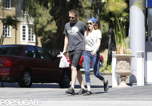 Robert Pattinson Gets Cute With His Pup During an Outing With Kristen Stewart Robert Pattinson Gets Cute With His Pup During an Outing With Kristen Stewart