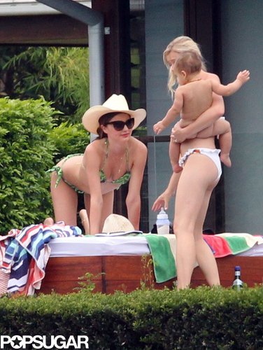 Miranda Kerr relaxed by the pool in Australia with baby Flynn and some friends in February 2012.
Miranda Kerr relaxed by the pool in Australia with baby Flynn and some friends in February 2012.