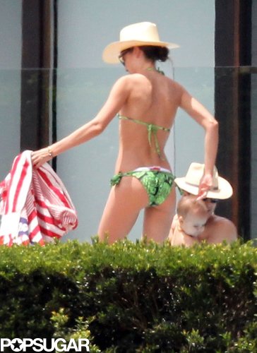 Miranda Kerr flaunted her bikini body in a green two-piece while lounging poolside with Orlando Bloom and baby Flynn in Australia in February 2012.
Miranda Kerr flaunted her bikini body in a green two-piece while lounging poolside with Orlando Bloom and baby Flynn in Australia in February 2012.