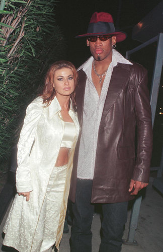 Carmen Electra and Dennis Rodman were married in Las Vegas in November 1998 for only nine days before calling off the union. Carmen later compared her decision to marry Dennis is Vegas to "getting a cheeseburger at a fast-food restaurant."
Carmen Electra and Dennis Rodman were married in Las Vegas in November 1998 for only nine days before calling off the union. Carmen later compared her decision to marry Dennis is Vegas to "getting a cheeseburger at a fast-food restaurant."