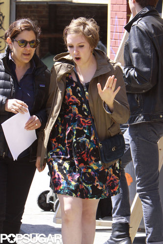 Lena Dunham walked to the set with a crew member.
Lena Dunham walked to the set with a crew member.