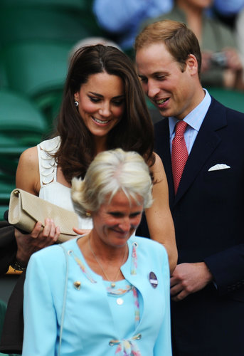 Prince William stuck close to Kate Middleton at the June 2011 Wimbledon Championships.
Prince William stuck close to Kate Middleton at the June 2011 Wimbledon Championships.