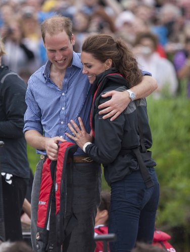 Prince William wrapped his arm around Kate Middleton in Charlottetown, Prince Edward Island, in July 2011.
Prince William wrapped his arm around Kate Middleton in Charlottetown, Prince Edward Island, in July 2011.