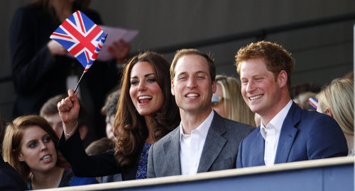 Kate Middleton and Prince William cheered during the Diamond Jubilee Concert in London with Prince Harry and Princess Beatrice in June 2012.
Kate Middleton and Prince William cheered during the Diamond Jubilee Concert in London with Prince Harry and Princess Beatrice in June 2012.