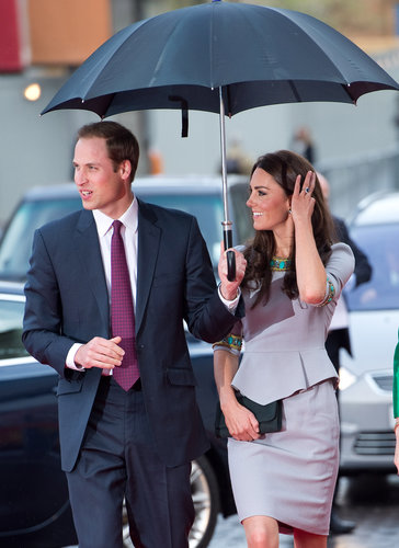Prince William held an umbrella for Kate Middleton on their way into the April 2012 premiere of African Cats in London.
Prince William held an umbrella for Kate Middleton on their way into the April 2012 premiere of African Cats in London.