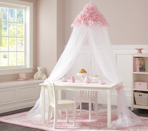 Make teatime whimsical with this ruffled pink canopy ($139). It's also a fitting choice over her bed too.
Make teatime whimsical with this ruffled pink canopy ($139). It's also a fitting choice over her bed too.