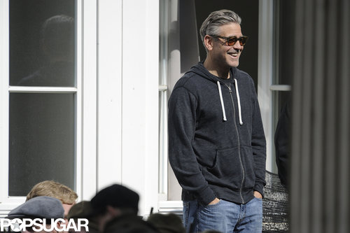 George Clooney laughed on set.
George Clooney laughed on set.