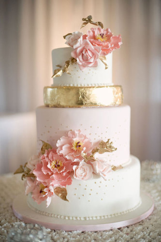 This beauty is practically blooming with pink petals and flecks of gold detail that are both timeless and tasteful.
Photo by Melissa Gidney Photography via Style Me Pretty
This beauty is practically blooming with pink petals and flecks of gold detail that are both timeless and tasteful.
Photo by Melissa Gidney Photography via Style Me Pretty