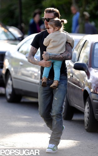 David Beckham walked with Harper in London.
David Beckham walked with Harper in London.