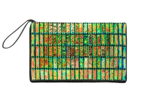 How can you deny this eye-catching Stella McCartney faux alligator clutch ($1,515)? Its holographic finish and patchwork-like appearance makes it feel really special — and it guarantees that any outfit will be a little bit less boring.
— Marisa Tom
How can you deny this eye-catching Stella McCartney faux alligator clutch ($1,515)? Its holographic finish and patchwork-like appearance makes it feel really special — and it guarantees that any outfit will be a little bit less boring.
— Marisa Tom